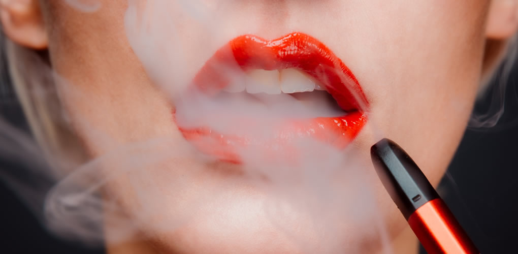 woman vaping red pod vape